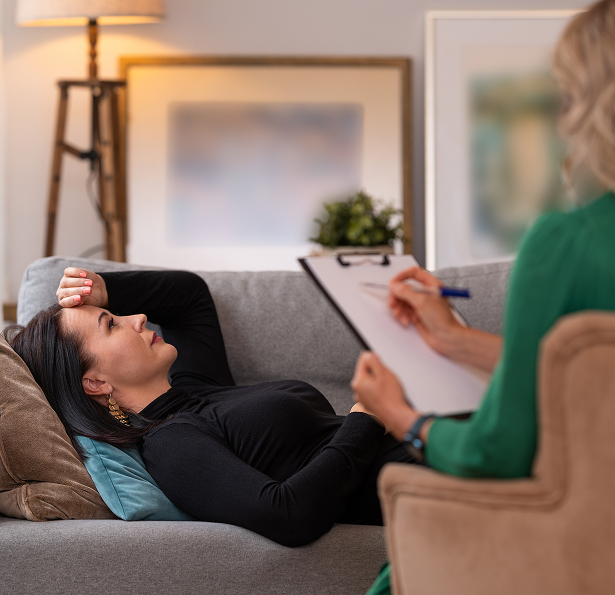 Women lying on couch